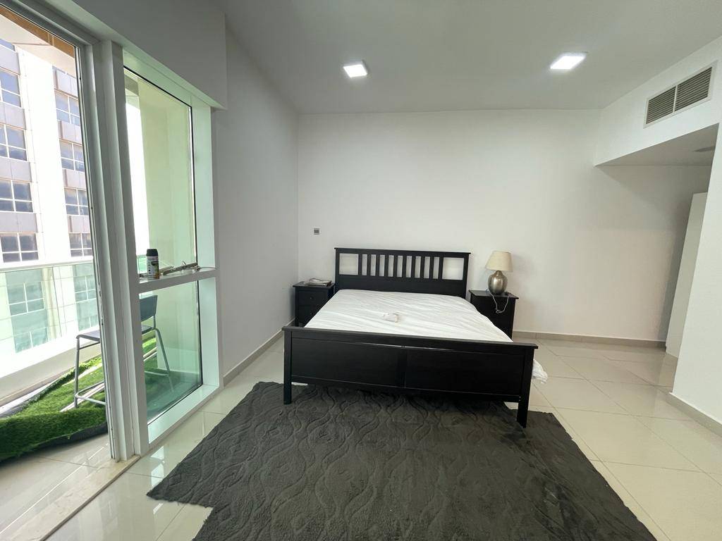 Master with attached balcony and bathroom available for rent.