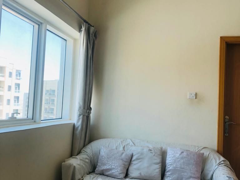 Fully furnished master room with attached balcony available for rent in Silicon oasis